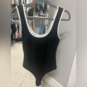 Black and white body suit Lelis size small